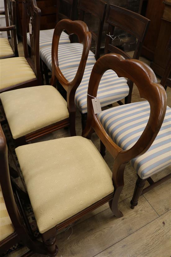 A pair of Victorian dining chairs with tapered legs